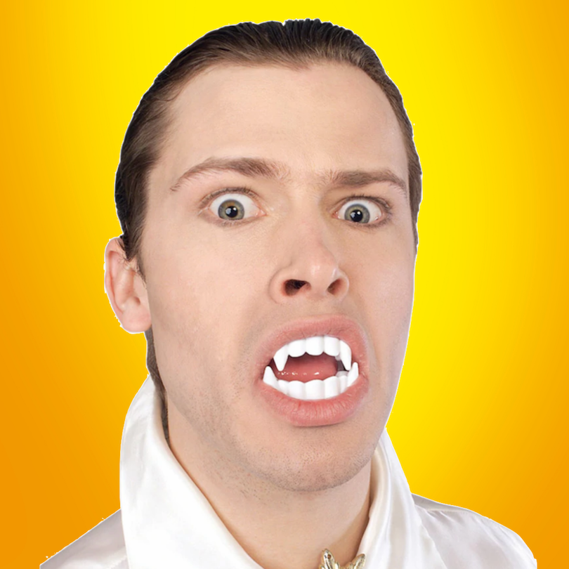 PLASTIC FAKE VAMPIRE TEETH
