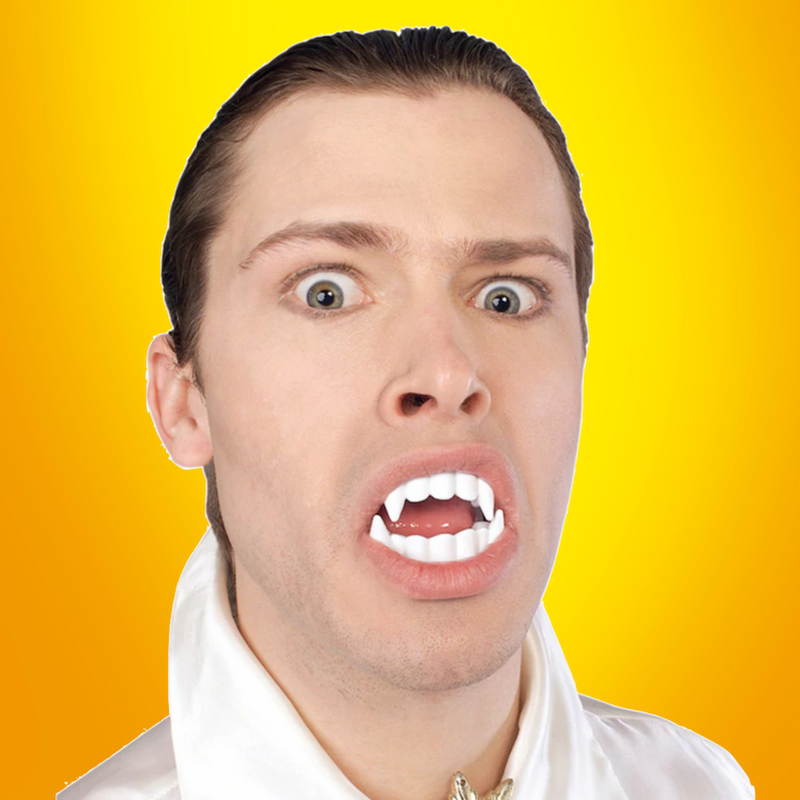 PLASTIC FAKE VAMPIRE TEETH